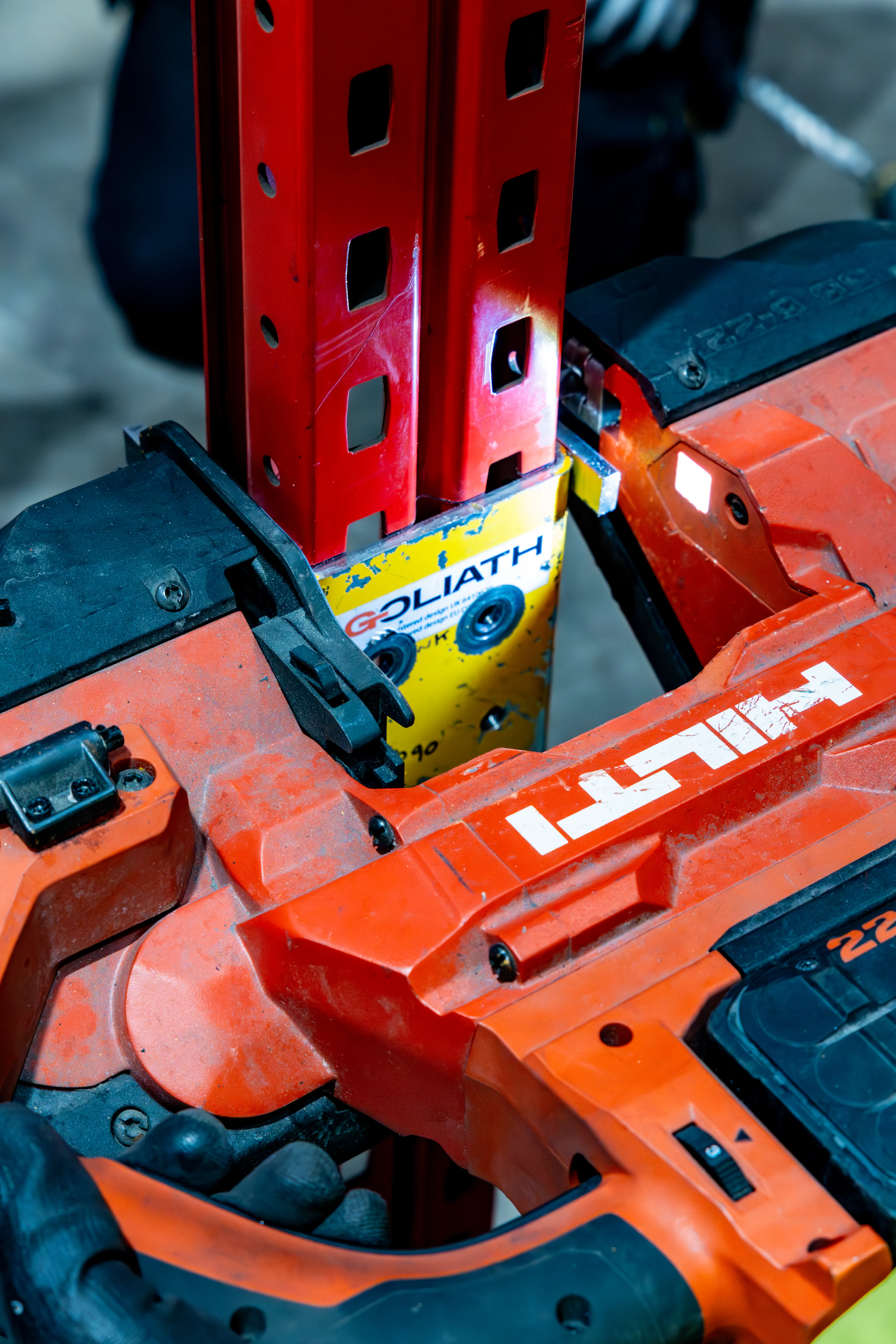 Racking upright reinforcement installed in warehouse bay