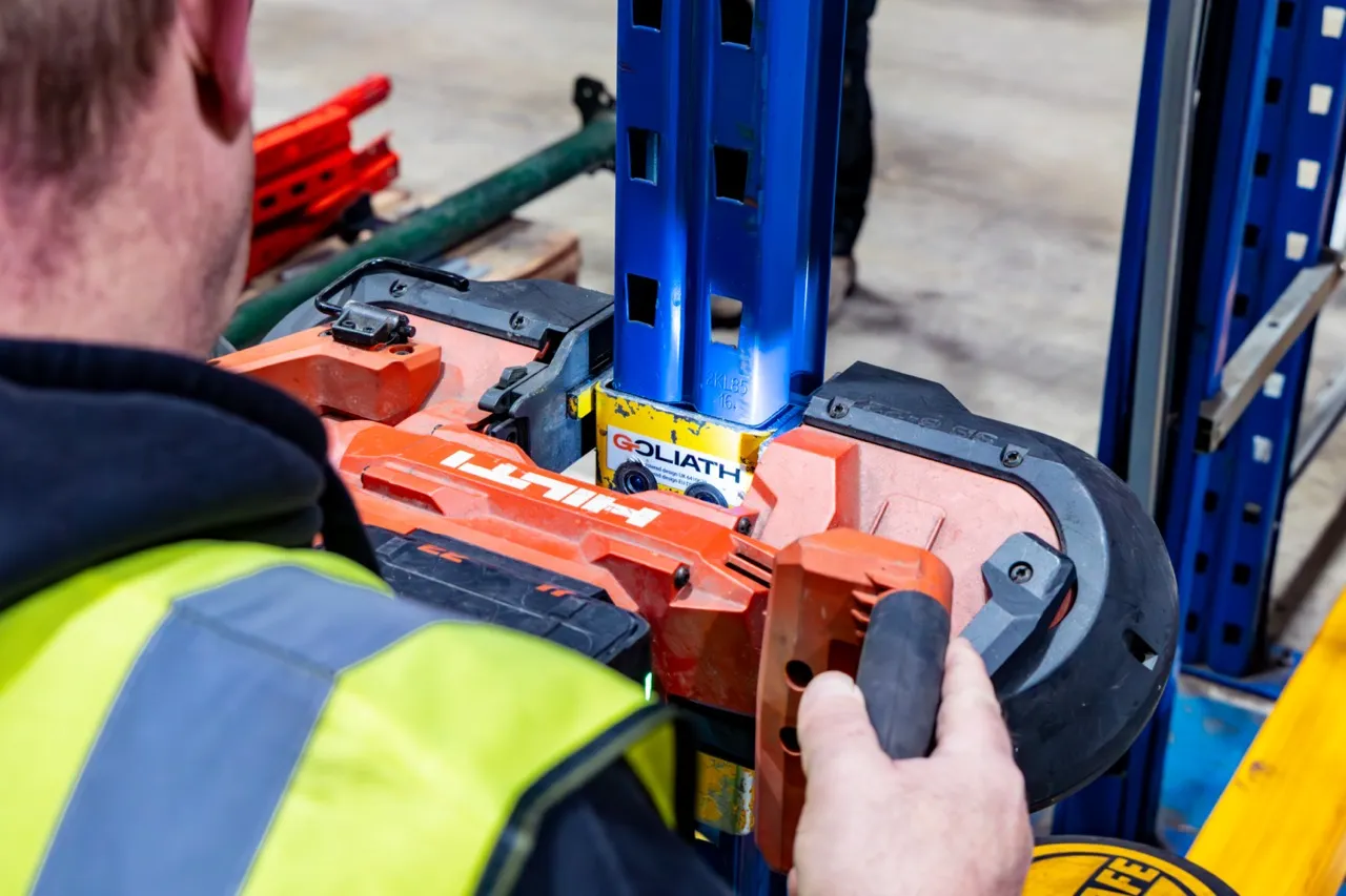 Warehouse racking aisle with protected uprights