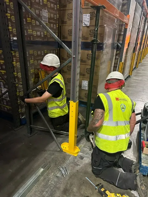 Mid-stage Goliath installation on damaged upright