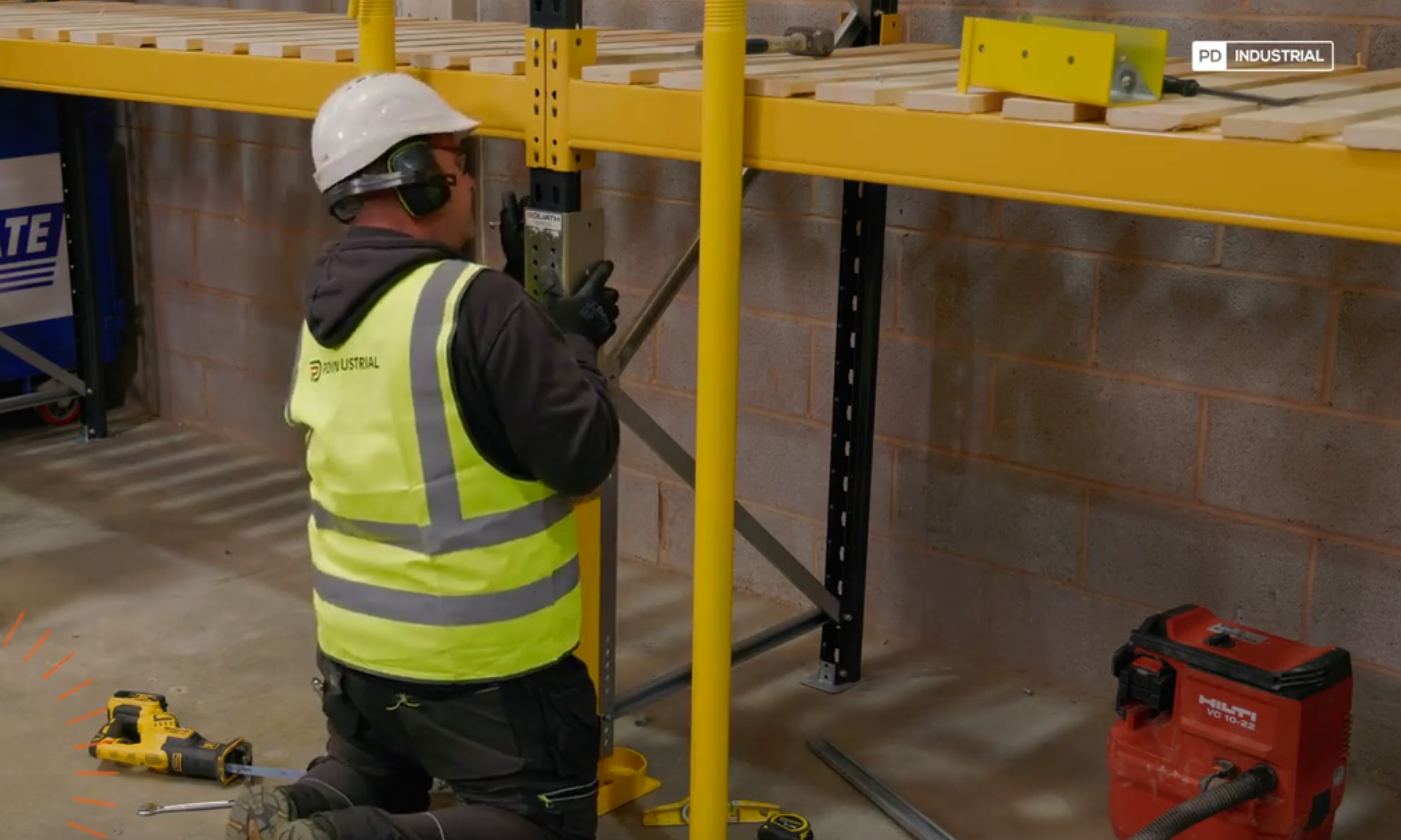 Worker installing Goliath